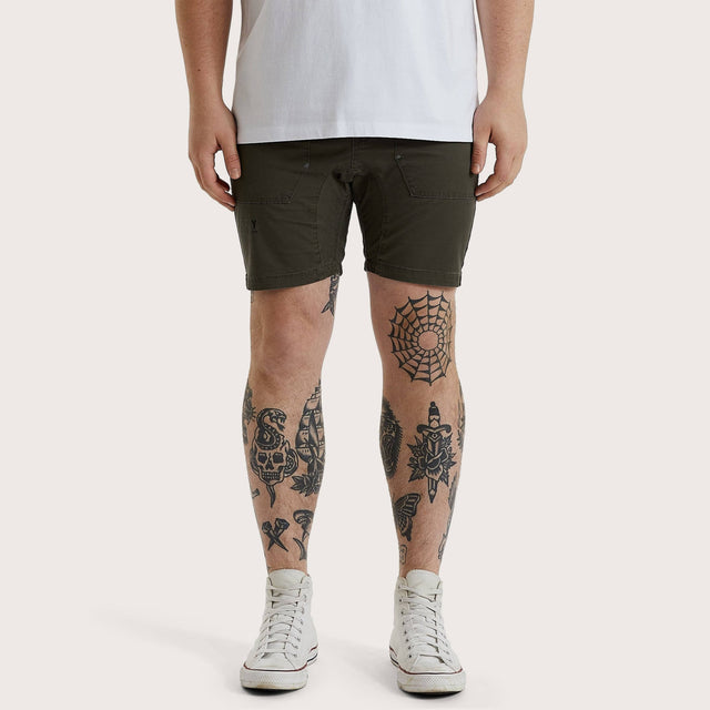 Model wears Brigham Shorts Storm Green Shorts in Green - Image 1