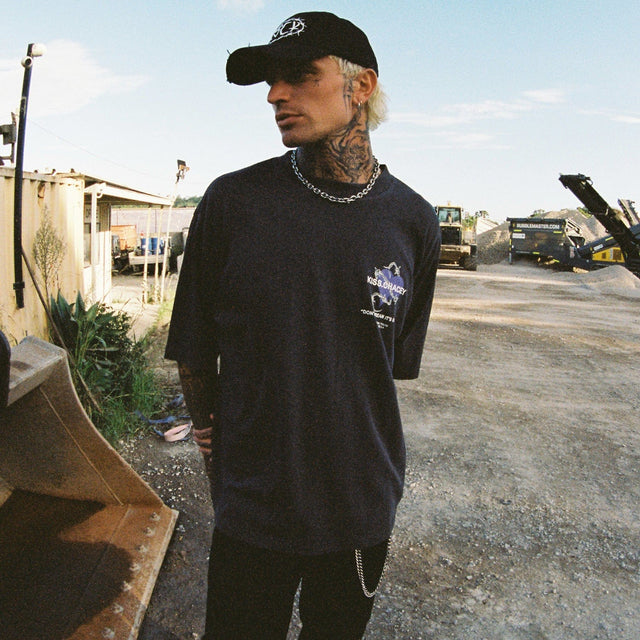 Model wears Confined Heavy Oversized Tee Pigment Black T-Shirts in Black - Image 4