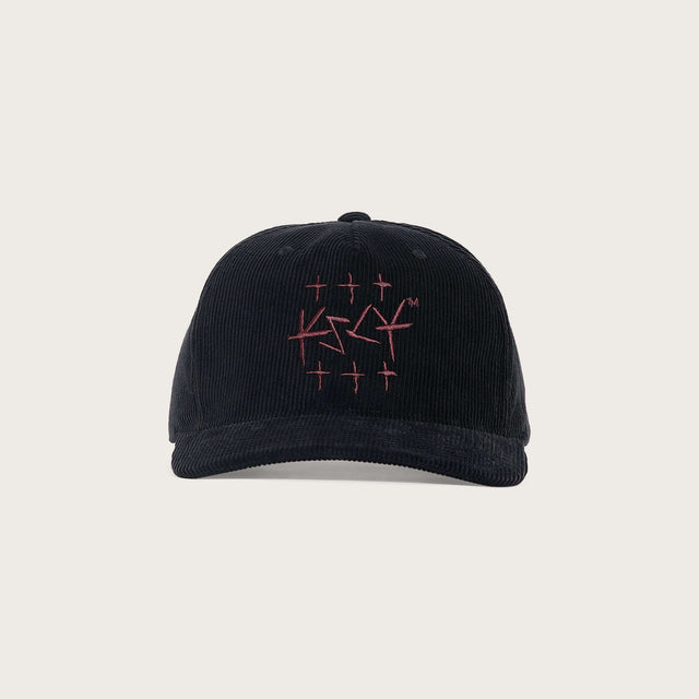 Model wears Crossroad 110 Cap Jet Black Headwear in Black - Image 3