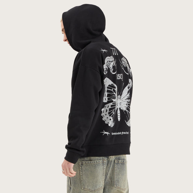 Model wears Download Oversized Hoodie Jet Black Hoodies in Black - Image 5