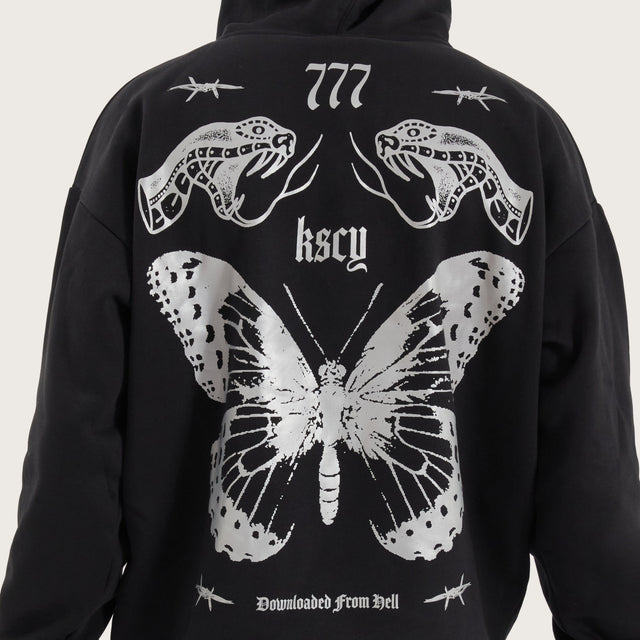 Model wears Download Oversized Hoodie Jet Black Hoodies in Black - Image 6