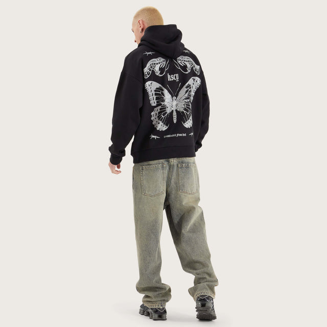 Model wears Download Oversized Hoodie Jet Black Hoodies in Black - Image 8