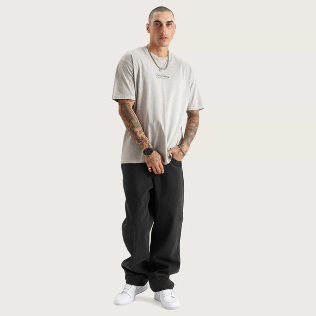Model wears East-7 Heavy Box Fit Tee Pigment Dove T-Shirts in Beige - Image 4