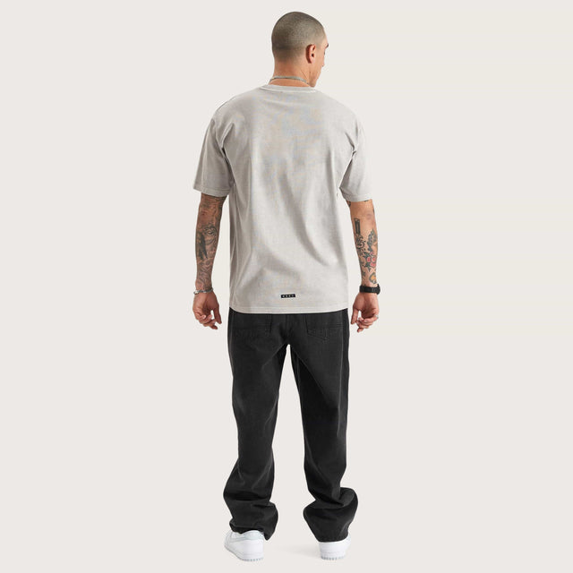 Model wears East-7 Heavy Box Fit Tee Pigment Dove T-Shirts in Beige - Image 5