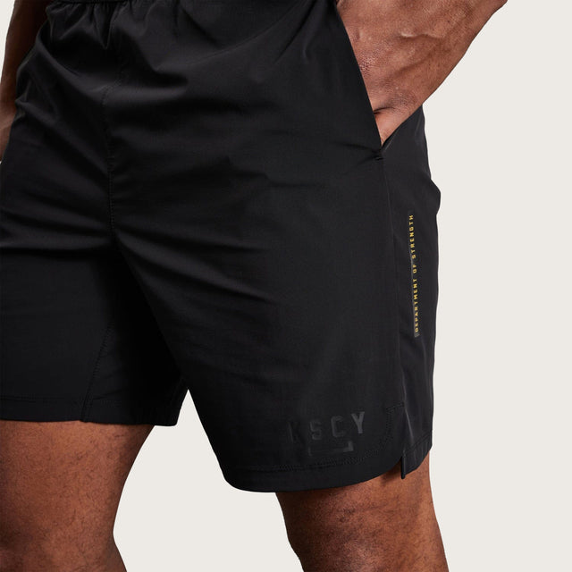Model wears Element Elasticated Short Black Shorts in Black - Image 2