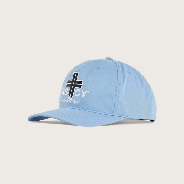 Model wears Foundation Golfer Cap Corn Flower Headwear in Blue - Image 2