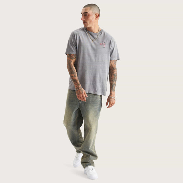 Model wears Hope Relaxed Tee Pigment Frost Grey T-Shirts in Grey - Image 7