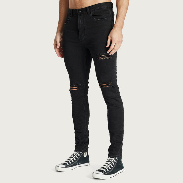 Model wears K1 Super Skinny Fit Jean Destroyed Washed Black Pants in Black - Image 3