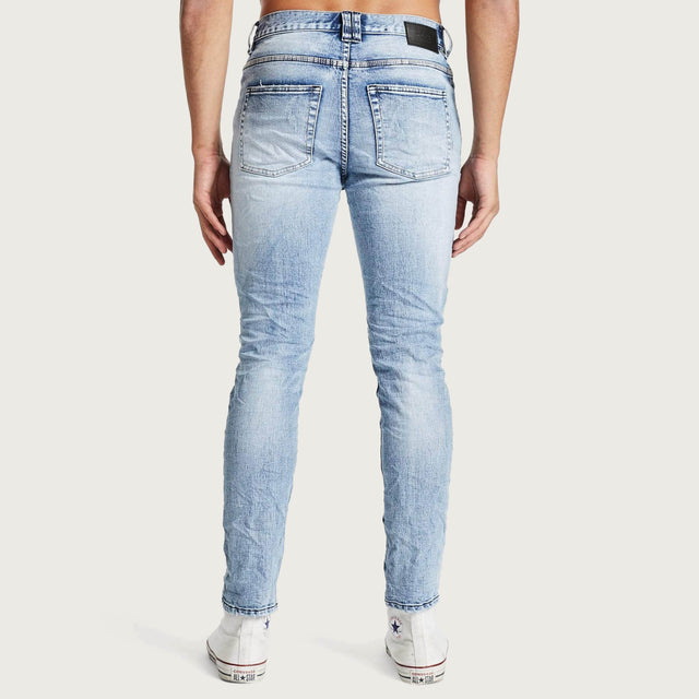 Model wears K2 Skinny Jean Worn'N'Torn Pants in Blue - Image 4