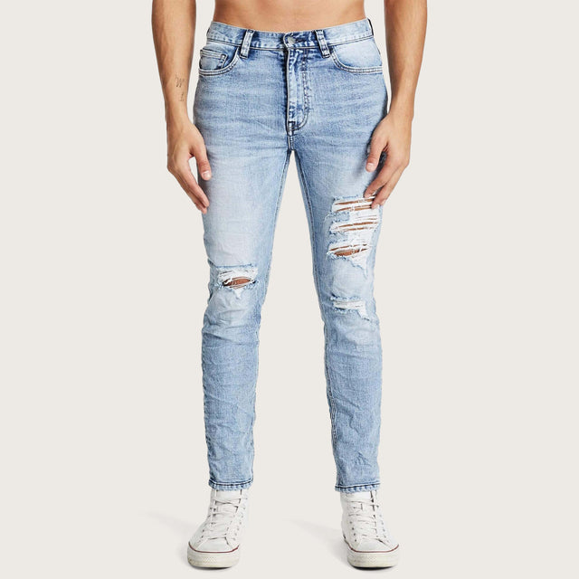 Model wears K2 Skinny Jean Worn'N'Torn Pants in Blue - Image 5