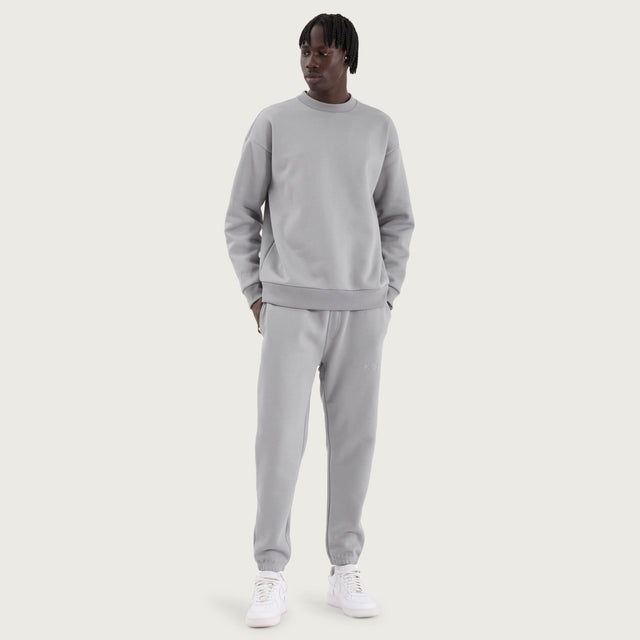 Model wears Kelsey Trackpant Pigment Ultimate Grey Trackpants in Grey - Image 2