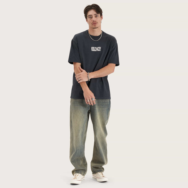 Model wears Luminary Heavy Box Fit Tee Pigment Vulcan T-Shirts in Grey - Image 5
