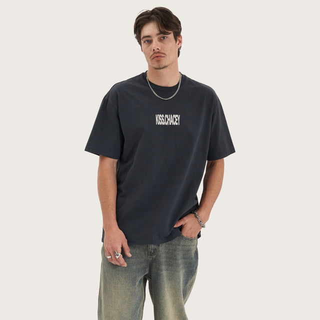 Model wears Luminary Heavy Box Fit Tee Pigment Vulcan T-Shirts in Grey - Image 2