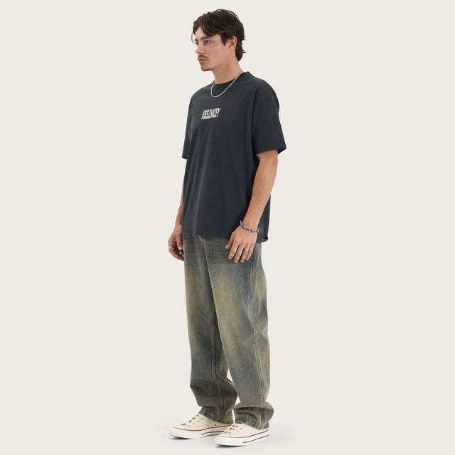 Model wears Luminary Heavy Box Fit Tee Pigment Vulcan T-Shirts in Grey - Image 6