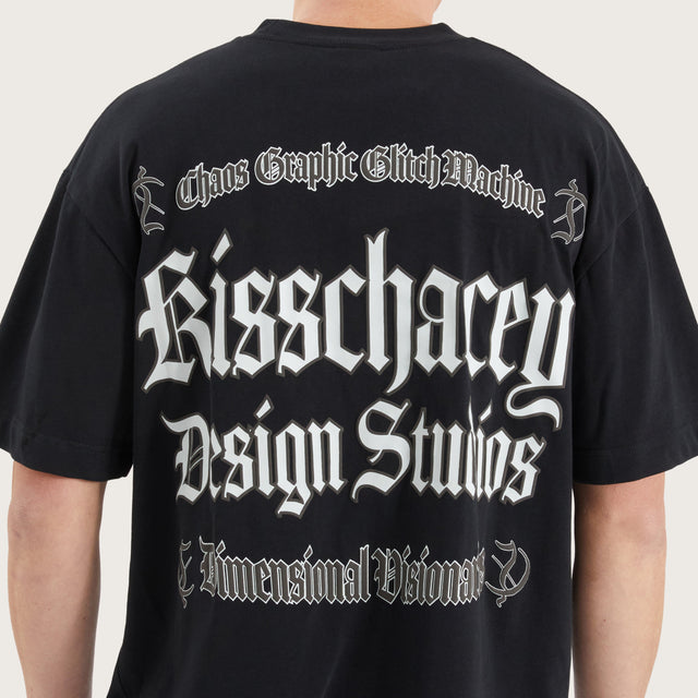 Model wears Machine Street Tee Anthracite Black T-Shirts in Black - Image 7