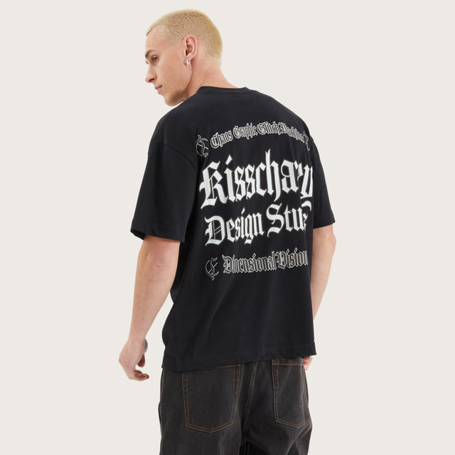 Model wears Machine Street Tee Anthracite Black T-Shirts in Black - Image 1