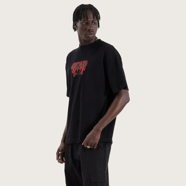 Model wears Movement Heavy Street Tee Jet Black T-Shirts in Black - Image 5