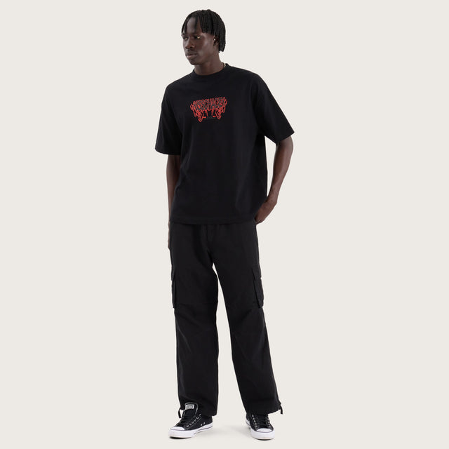 Model wears Movement Heavy Street Tee Jet Black T-Shirts in Black - Image 7
