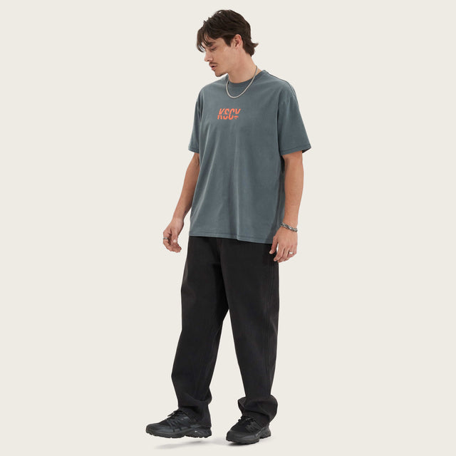 Model wears Mystic Quest Box Fit Tee Pigment Turbulence T-Shirts in Grey - Image 5