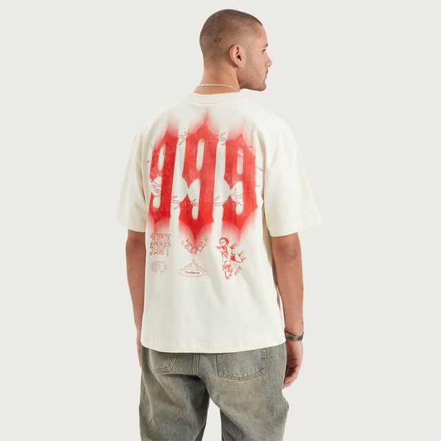 Model wears Prison Street Fit Tee Tofu T-Shirts in Off-White - Image 1