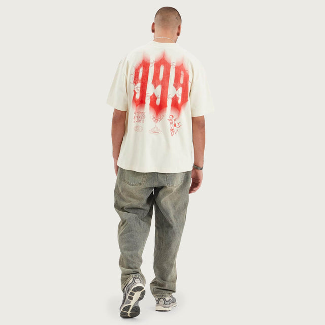 Model wears Prison Street Fit Tee Tofu T-Shirts in Off-White - Image 4