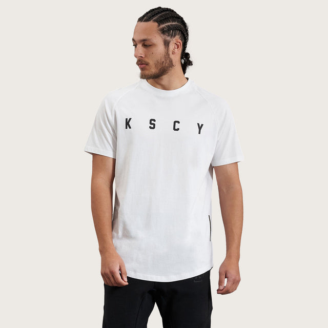 Model wears Process Raglan Curved Hem T-Shirt White T-Shirts in White - Image 3