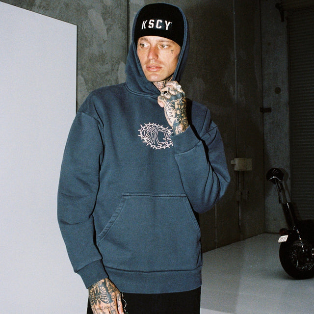 Model wears Riftborne Heavy Relaxed Hoodie Pigment Asphalt Hoodies in Grey - Image 4