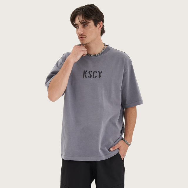 Model wears Schism Heavy Oversized Tee Pigment Steel T-Shirts in Grey - Image 2