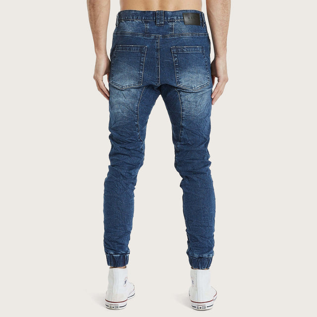 Model wears Spectra Jogger Pant Ozark Blue Pants in Blue - Image 3
