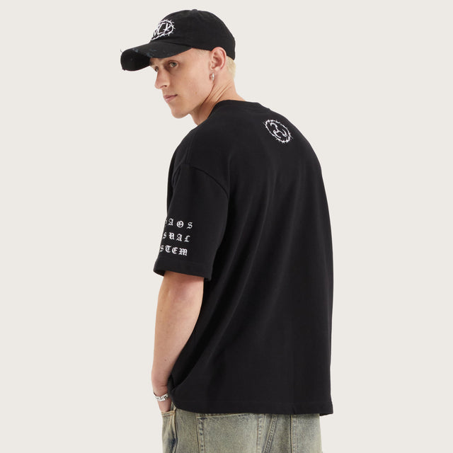 Model wears System Loopback Street Tee Jet Black T-Shirts in Black - Image 3