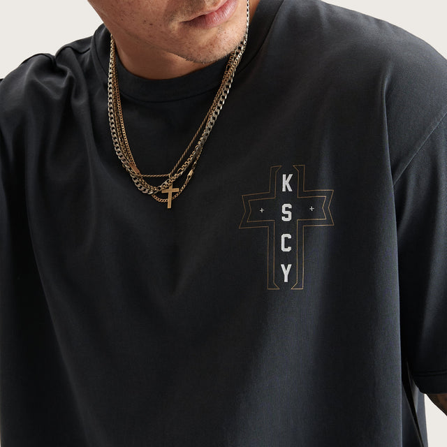 Model wears The Knight Heavy Box Fit Tee Pigment Black T-Shirts in Black - Image 3