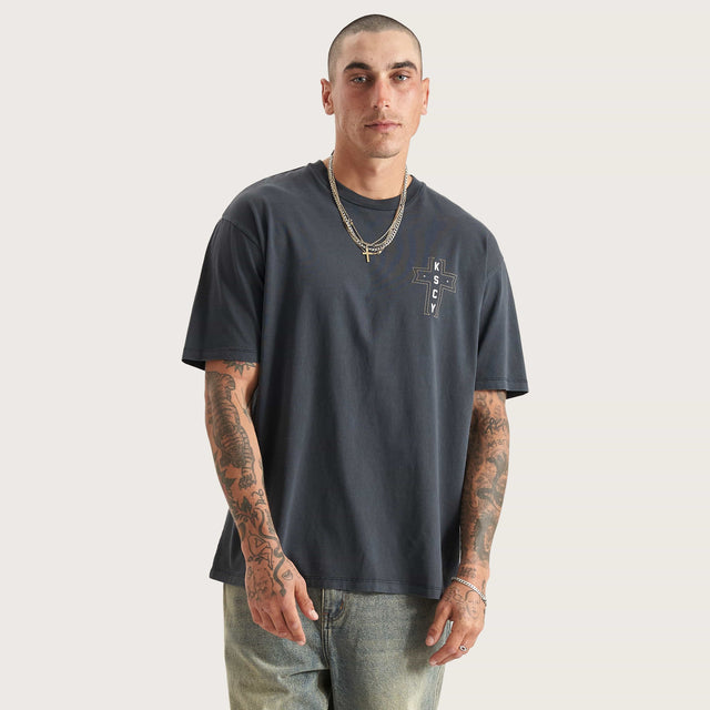 Model wears The Knight Heavy Box Fit Tee Pigment Black T-Shirts in Black - Image 2