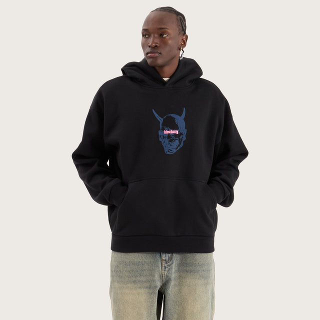 Model wears Witchcraft Oversized Hoodie Jet Black Hoodies in Black - Image 2