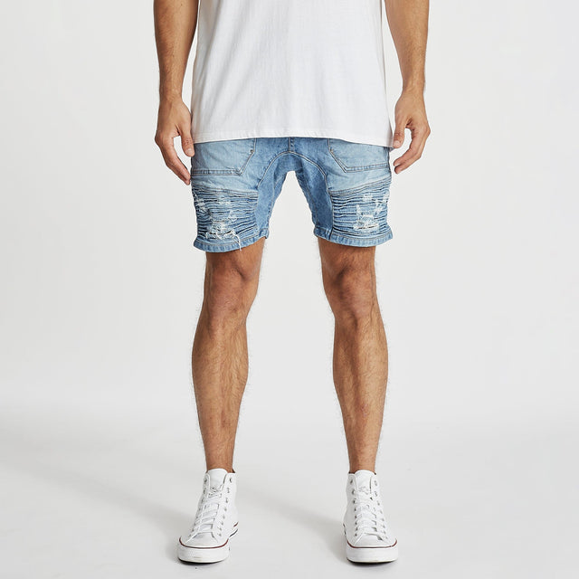 Model wears Carter Denim Shorts Horizon Blue Shorts in Blue - Image 1