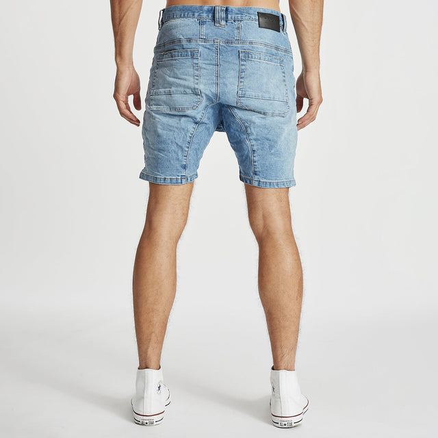 Model wears Carter Denim Shorts Horizon Blue Shorts in Blue - Image 6