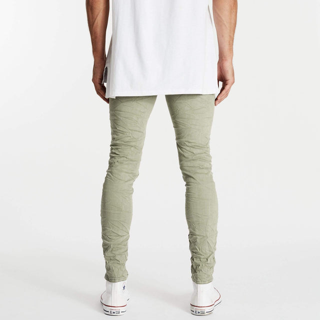 Model wears K1 Super Skinny Jeans Destroyed Lichen Green Pants in Green - Image 2