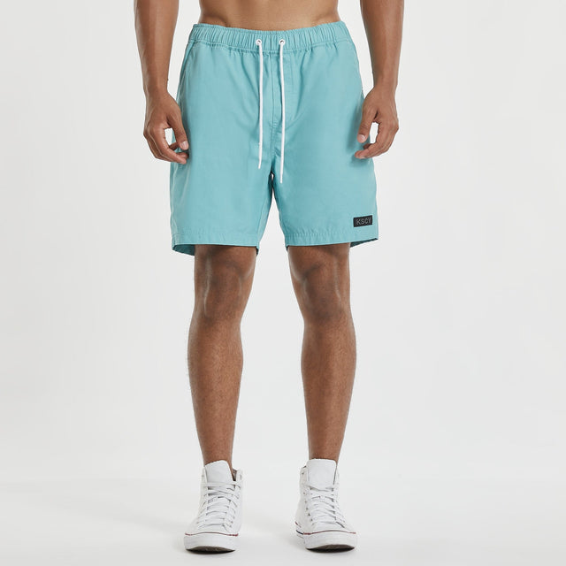 Model wears Sunrise Beach Short Turquoise Shorts in Blue - Image 4