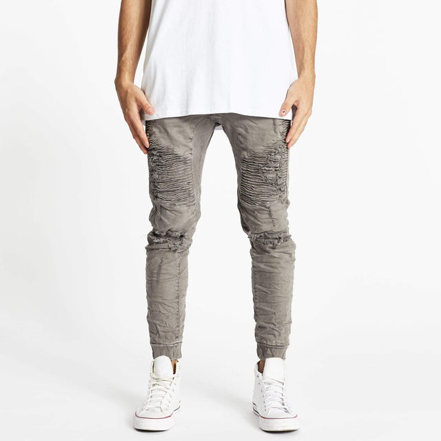 Model wears Zeppelin Pants Dark Stone Pants in Grey - Image 1