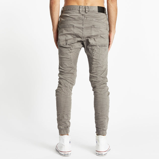 Model wears Zeppelin Pants Dark Stone Pants in Grey - Image 5