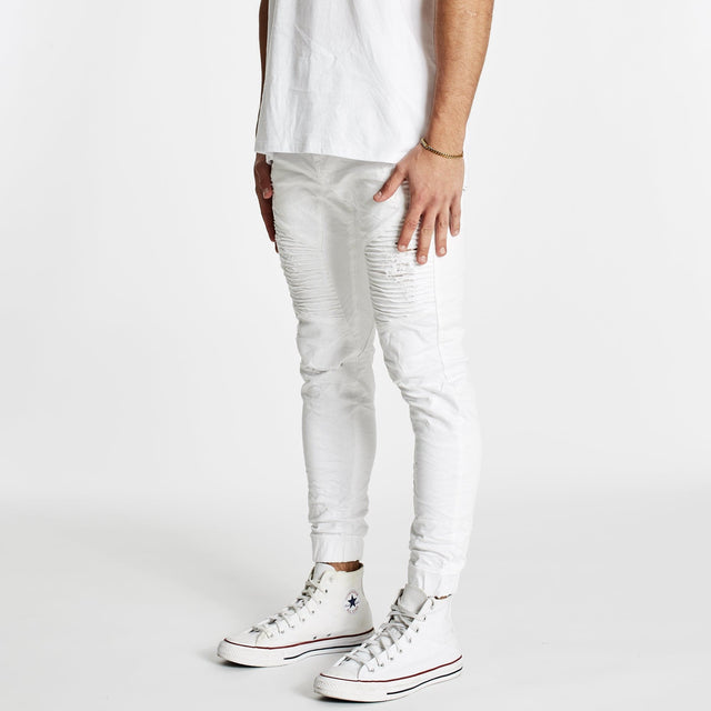 Model wears Zeppelin Pants White Pants in White - Image 3