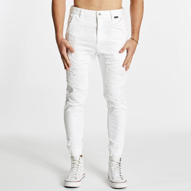 Model wears Zeppelin Pants White Pants in White - Image 4