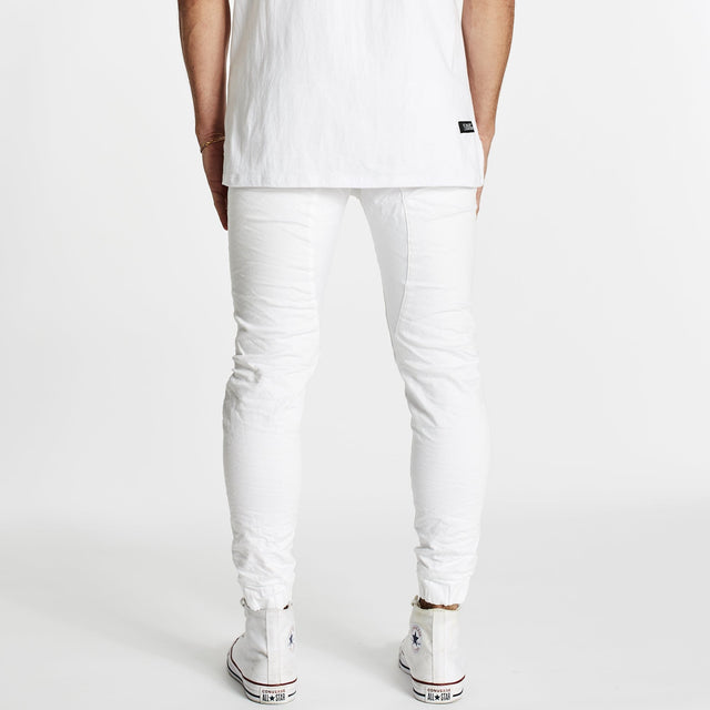 Model wears Zeppelin Pants White Pants in White - Image 2
