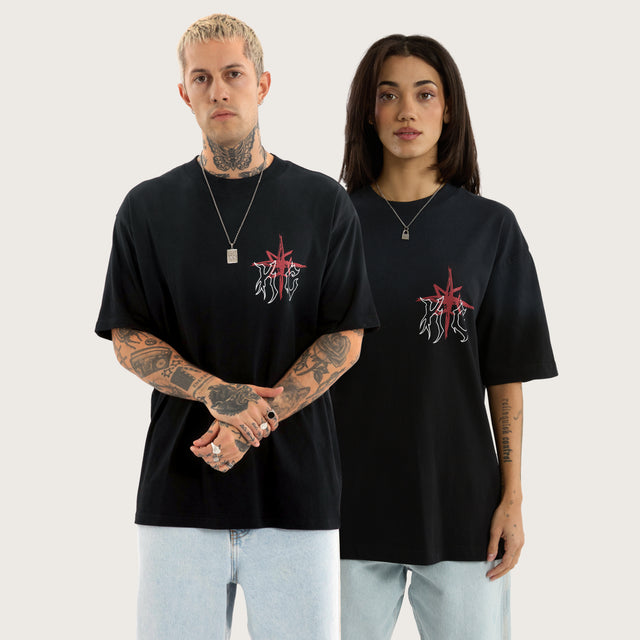 Model wears Coven Box Fit Tee in Jet Black T-Shirts in Black - Image 1