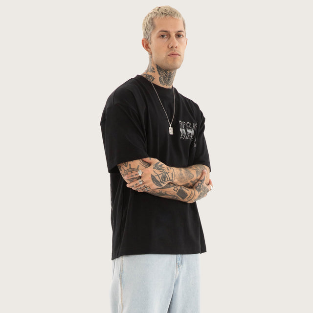 Model wears Thrive Street Tee in Jet Black T-Shirts in Black - Image 4