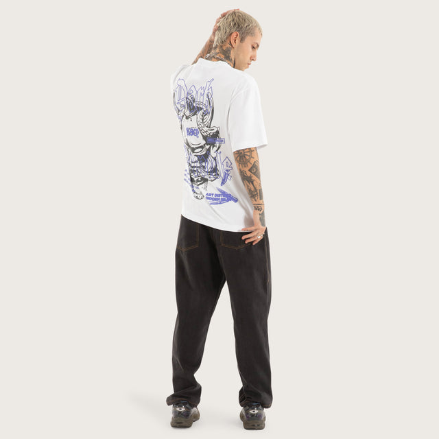 Model wears Strains Street Tee White T-Shirts in White - Image 6
