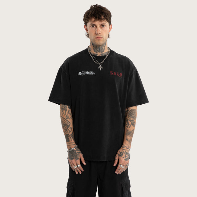 Model wears Instake Street Tee Snow Black T-Shirts Black – image 7