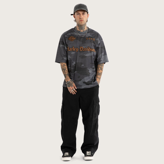 Model wears Merge Gridiron Jersey Camo Jerseys Brown – image 5