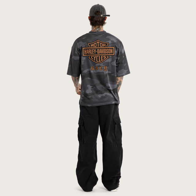 Model wears Merge Gridiron Jersey Camo Jerseys Brown – image 6