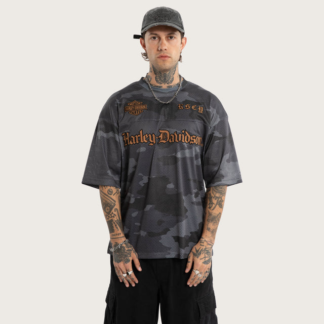 Model wears Merge Gridiron Jersey Camo Jerseys Brown – image 7