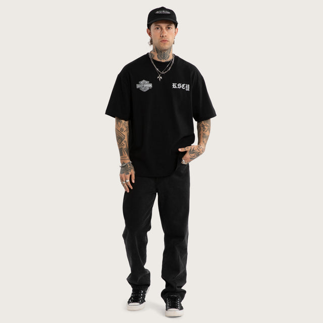 Model wears Scrambler Street Tee Jet Black T-Shirts Black – image 5